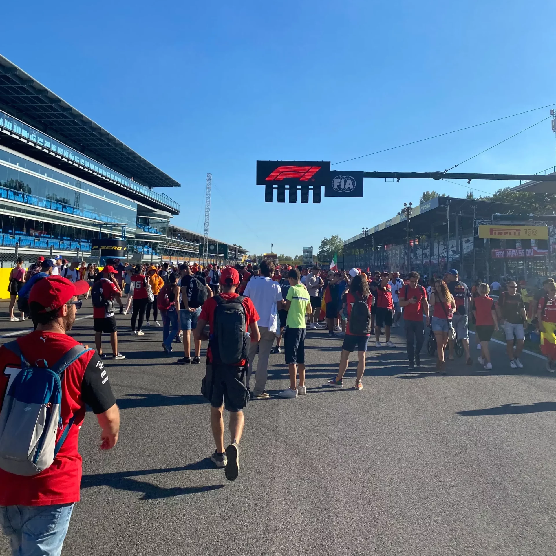 The spectators on the main straight after the race.